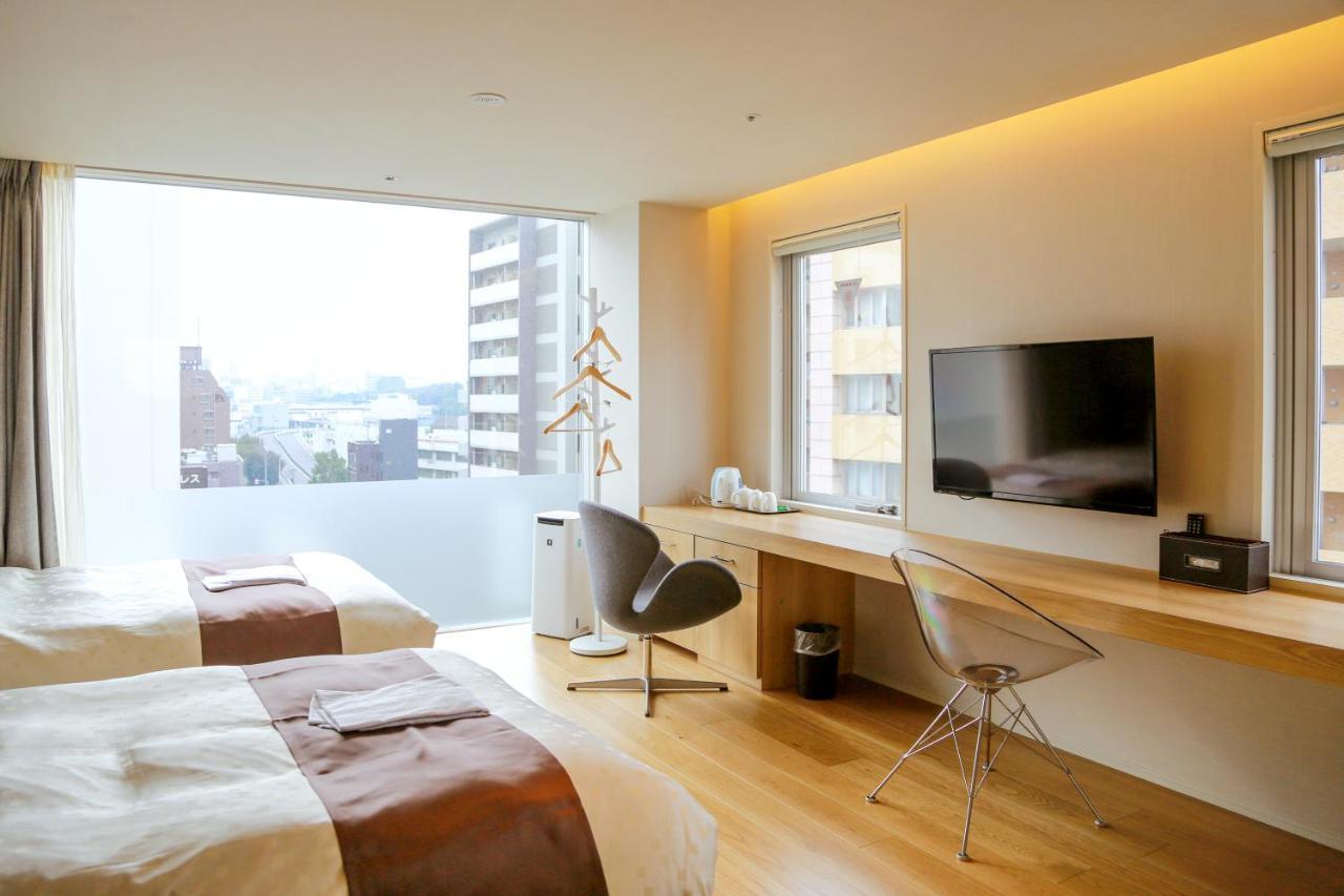Hotel Comfact Tokyo Bagian luar foto